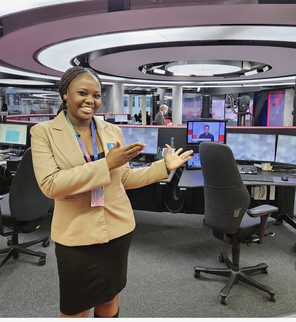 Tayo Ojewunmi-Ojo in a professional newsroom environment